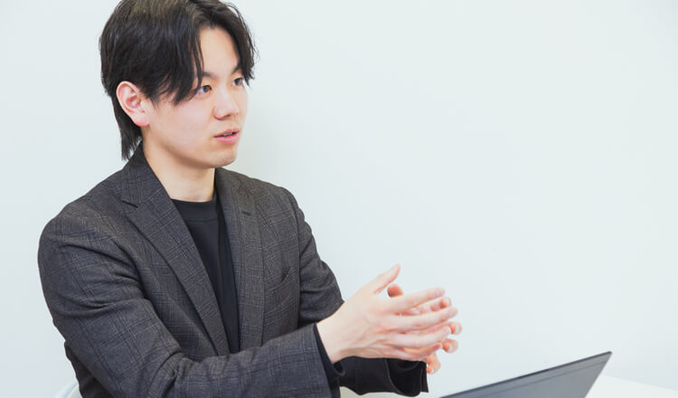 改善活動とその結果に対する考察を述べる楢村氏